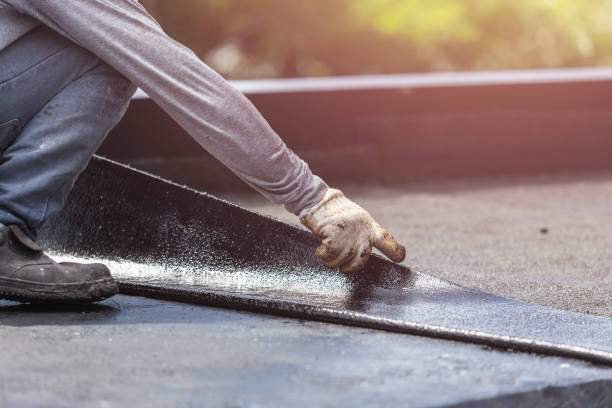 Professional Basement Waterproofing technician working in Turin, GA